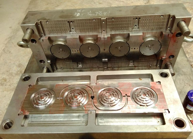 Injection mold for coaster lid